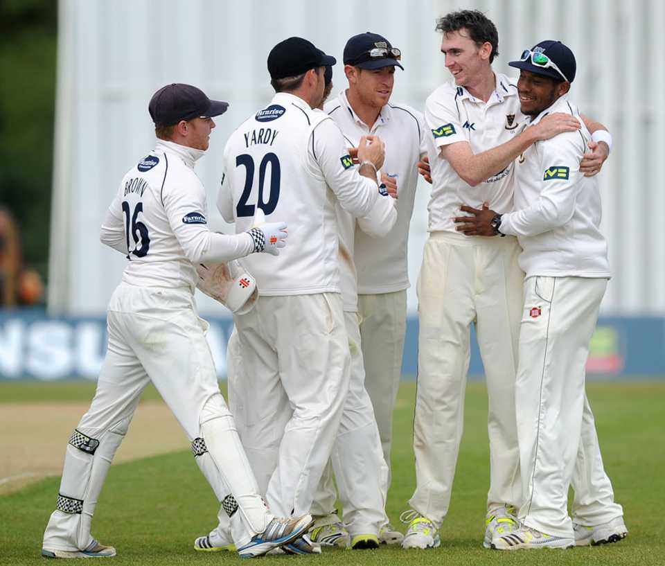 Steve Magoffin is congratulated on another wicket