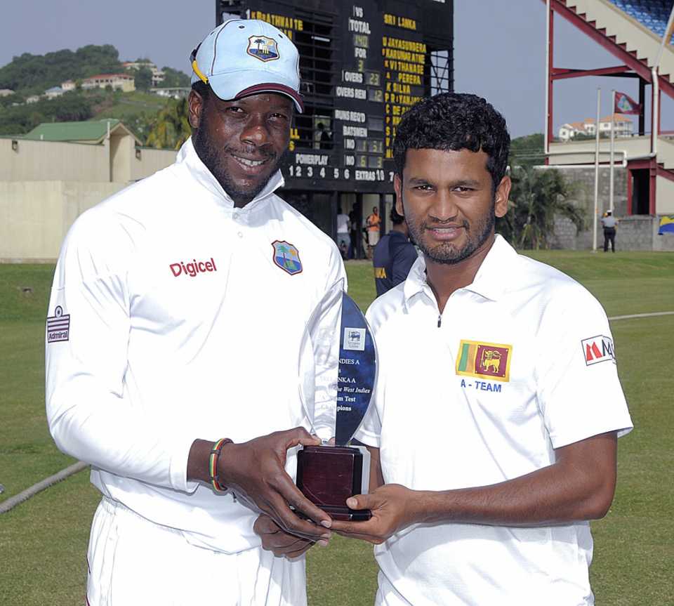 Kirk Edwards and Dimuth Karunaratne with the trophy after the series was drawn, West Indies A v Sri Lanka A, 2nd unofficial Test, 4th day, Kingstown, June 15, 2013