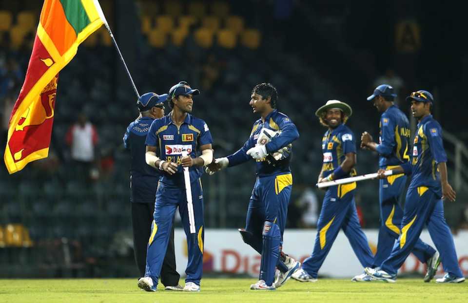 Sri Lanka players celebrate their win in the series opener