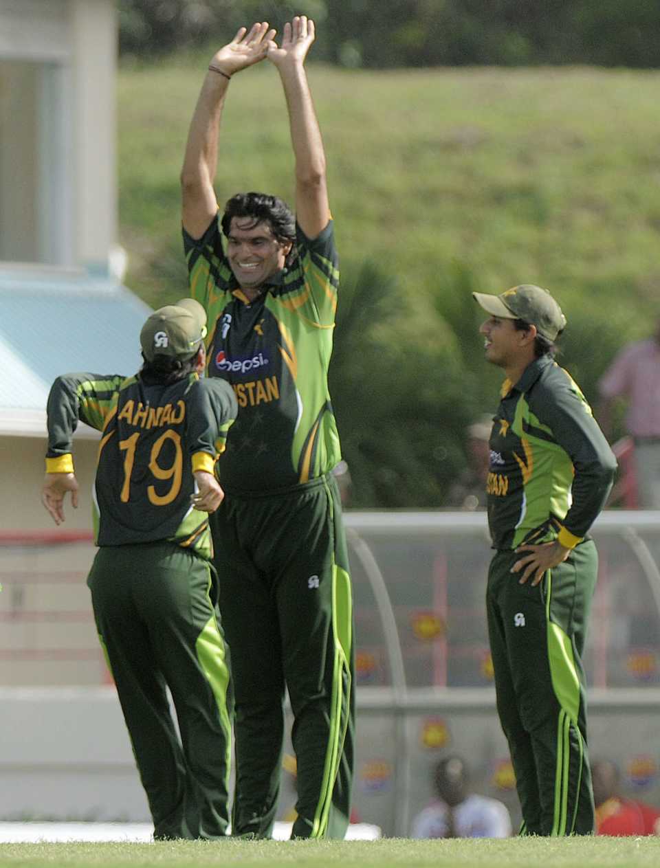 Ahmed Shehzad has plenty of work to do to high-five Mohammad Irfan, West Indies v Pakistan, 3rd ODI, St Lucia, July 19, 2013