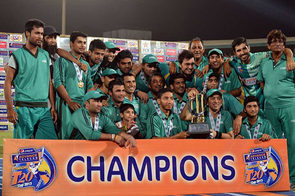 The victorious Habib Bank Limited with the Ramadan T20 Cup trophy, Habib Bank Limited v Pakistan International Airlines, Ramadan T20 Cup, final, Karachi, July 26, 2013