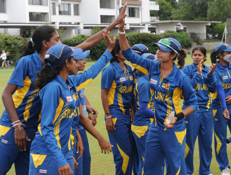 Sripali Weerakkody is congratulated by her team-mates