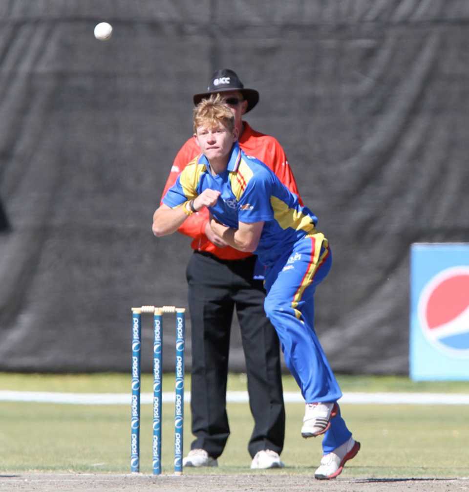 Namibia's left-arm spinner Bernard Scholtz in his delivery stride