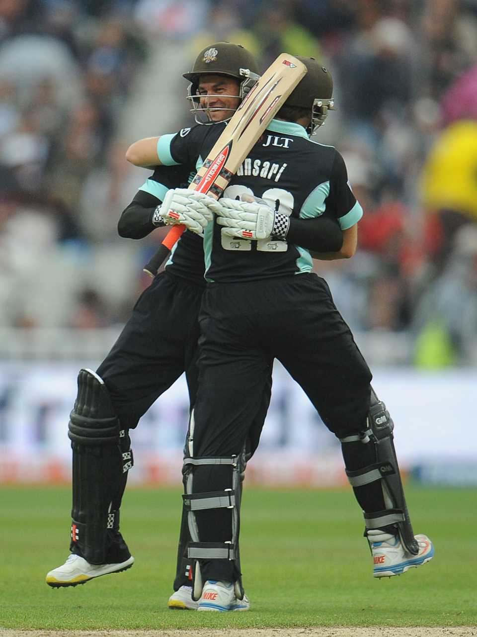 Zafar Ansari and Zander de Bruyn embrace after victory is sealed