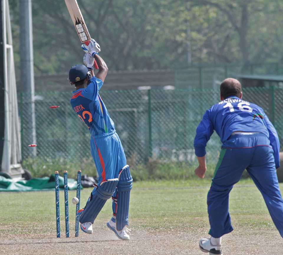 Mirwais Ashraf castles Suryakumar Yadav's stumps, Afghanistan v India Under-23s, Group A, Asian Cricket Council Emerging Teams Cup, Singapore, August 22, 2013