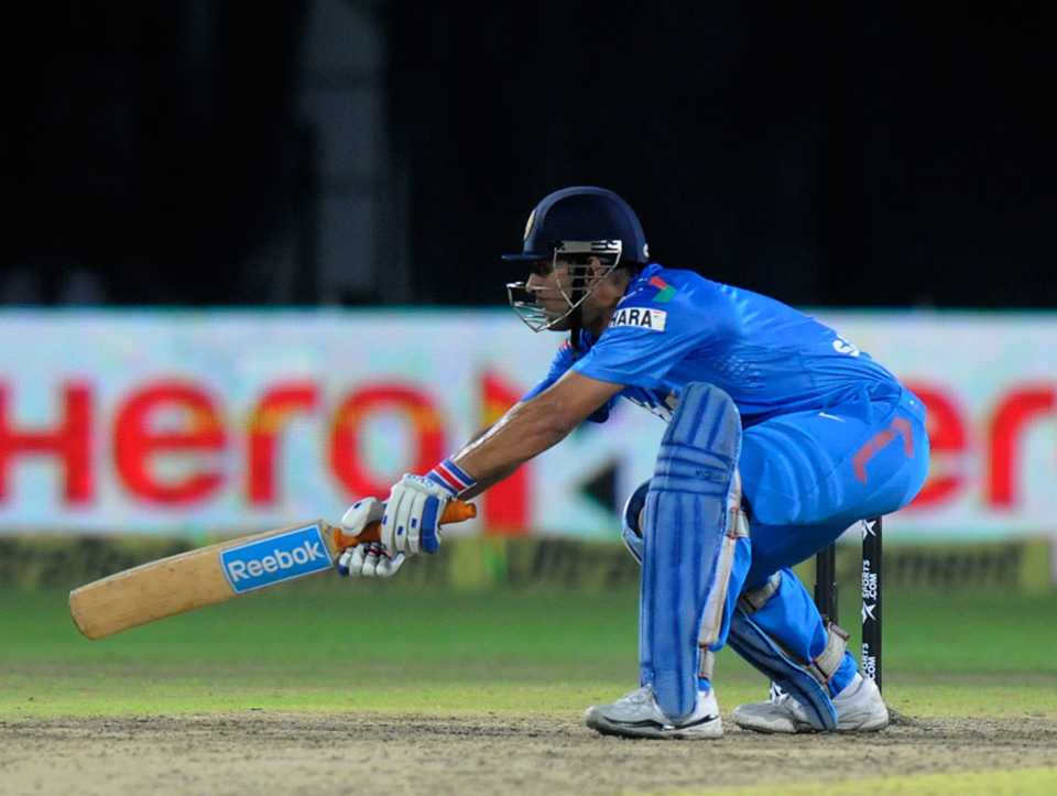 MS Dhoni scythes through the off side, India v Australia, one-off T20, Rajkot, October 10, 2013