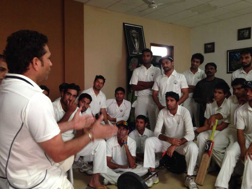 Sachin Tendulkar talks to members of the Haryana Ranji team