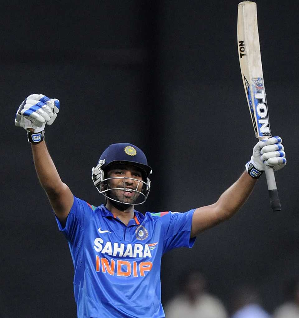 Rohit Sharma celebrates his double-century off 156 balls, India v Australia, 7th ODI, Bangalore, November 2, 2013