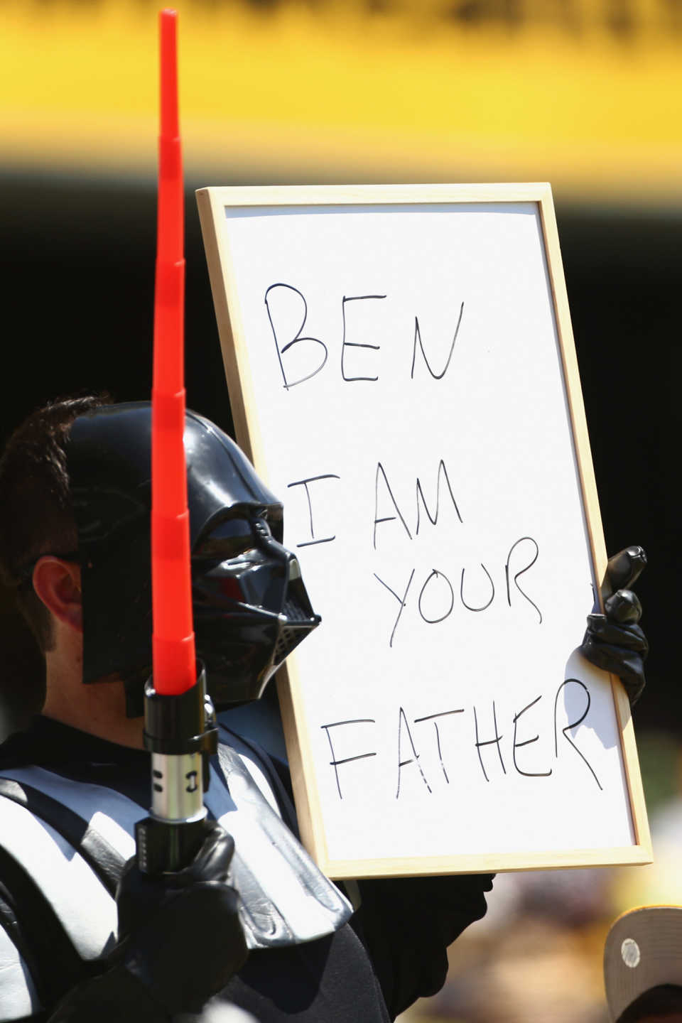 Darth Vader holds up a sign for Ben Cutting