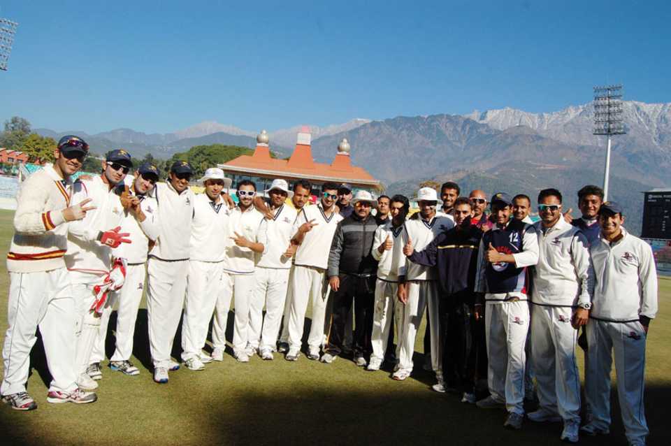 The Himachal Pradesh players line up after their victory, Himachal Pradesh v Assam, Ranji Trophy, Group C, Dharmasala, November 30, 2013