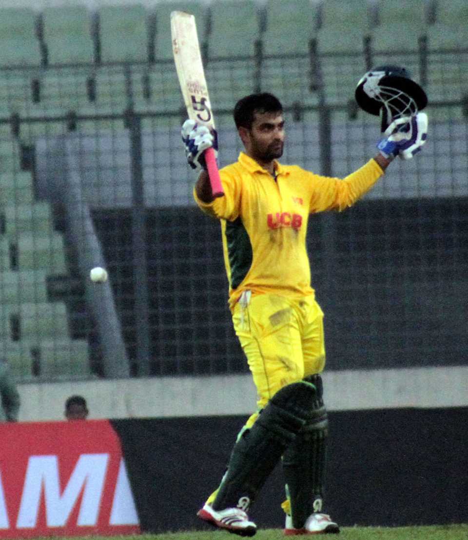 Tamim Iqbal acknowledges the crowd after reaching a maiden T20 ton