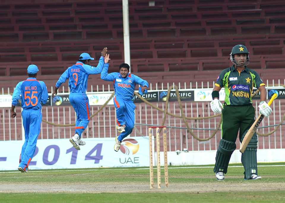 India's U19 players celebrate after dismissing Pakistan U19 captain Sami Aslam for 87