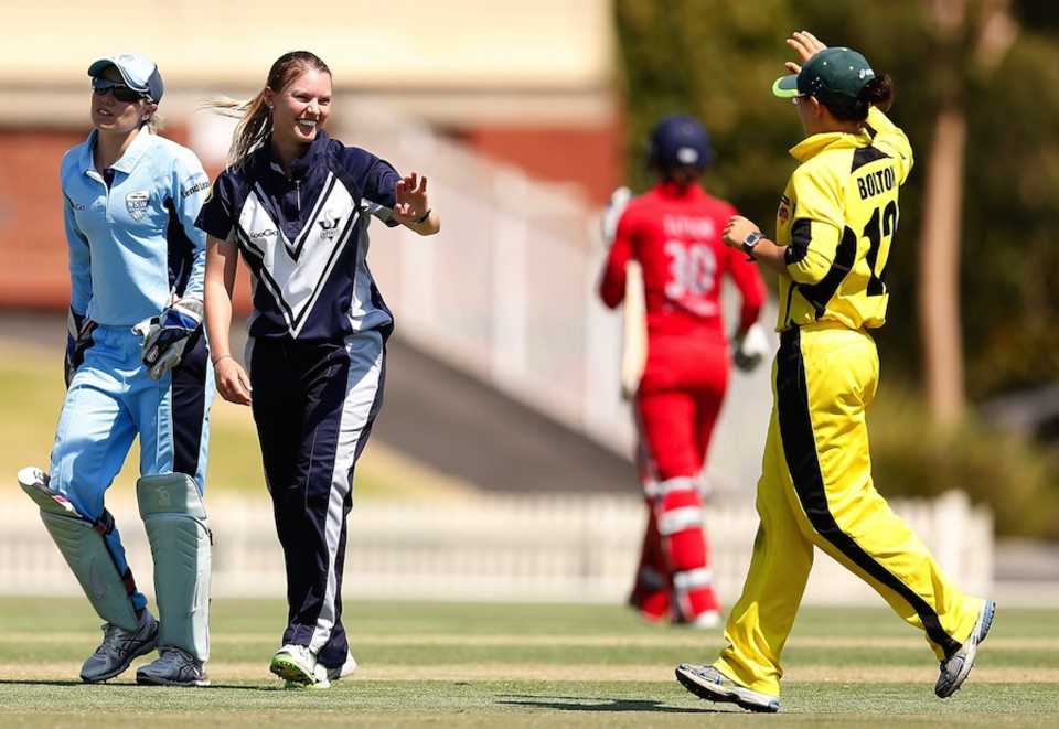 Kristen Beams is congratulated after a wicket, CA Chairman's Women's XI v England Women, Melbourne, January 17, 2014