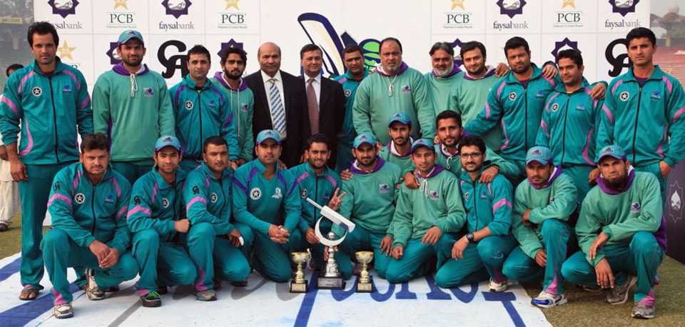 The victorious Rawalpindi team pose with the Quaid-e-Azam trophy