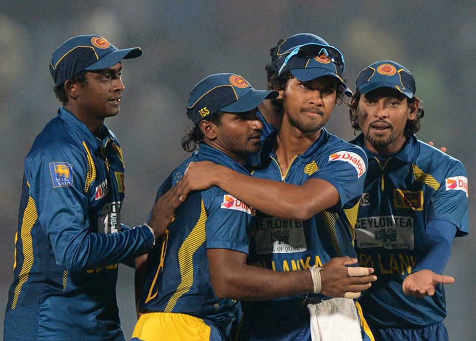 Sri Lanka's players celebrate their 2-run win, Bangladesh v Sri Lanka, 1st T20, Chittagong, February 12, 2014