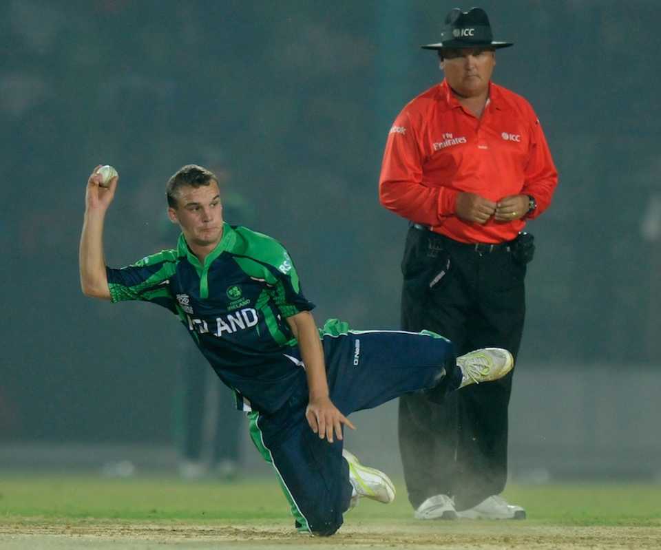 Andy McBrine fields off his own bowling, Ireland v Nepal, World T20 warm-up, Fatullah, March 12, 2014