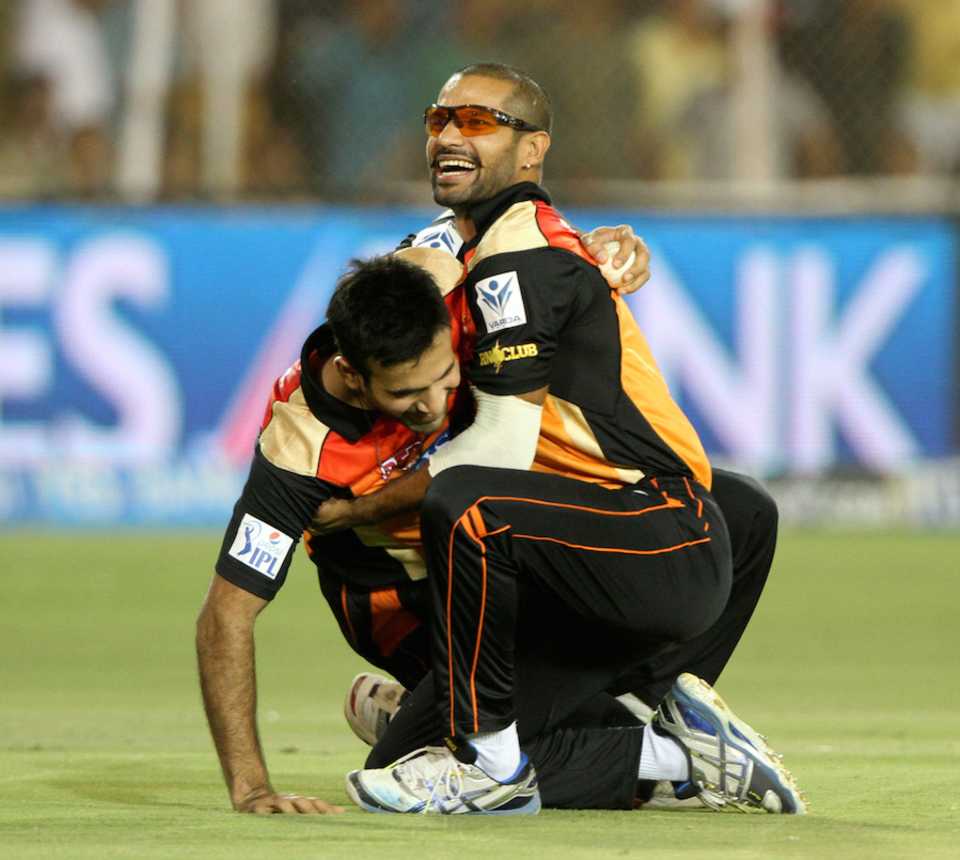 Shikhar Dhawan embraces Irfan Pathan after the latter took a skier