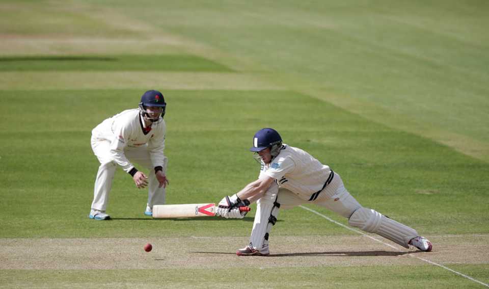 Eoin Morgan reverse sweeps on his way to an unbeaten 76