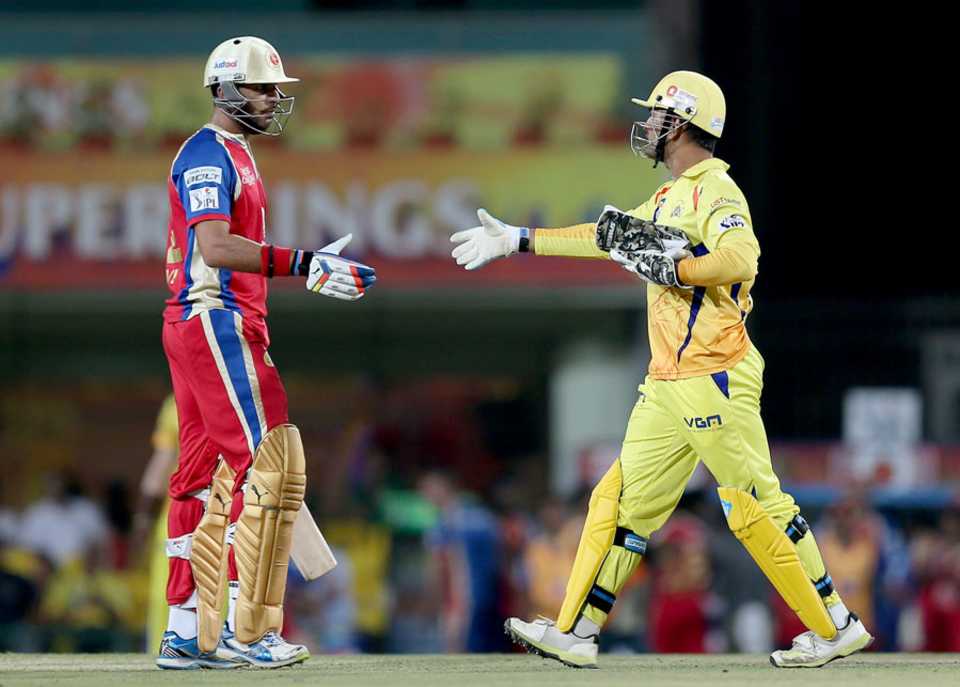 Yuvraj Singh and MS Dhoni shake hands after the match