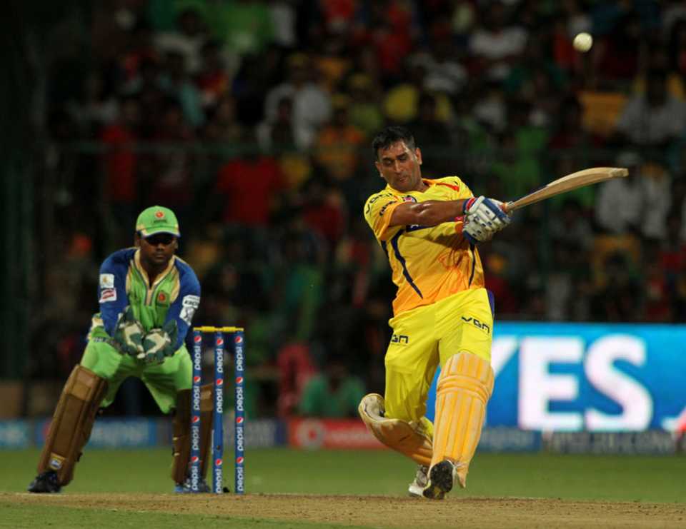 MS Dhoni lashes the ball down the ground, Royal Challengers Bangalore v Chennai Super Kings, IPL 2014, Bangalore, May 24, 2014