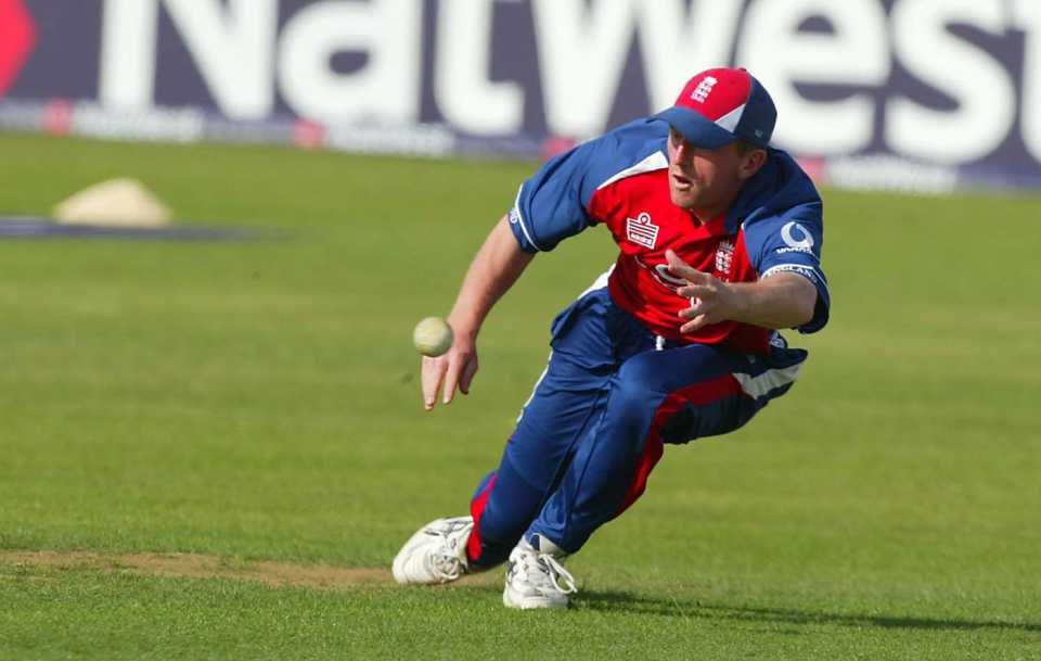 Paul Collingwood dives in an attempt to stop the ball