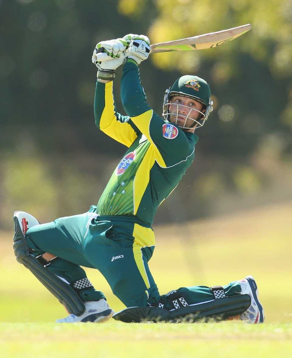 Phillip Hughes slashes over the top
