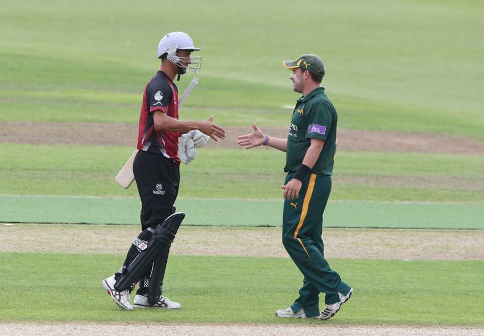 Tim Groenewald and Steven Mullaney shakes hands on a tie