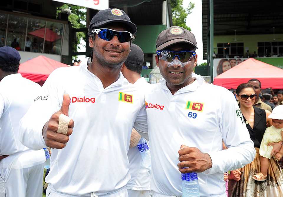 Kumar Sangakkara and Mahela Jayawardene pose for one last photo in whites, Sri Lanka v Pakistan, 2nd Test, SSC, 5th day, August 18, 2014