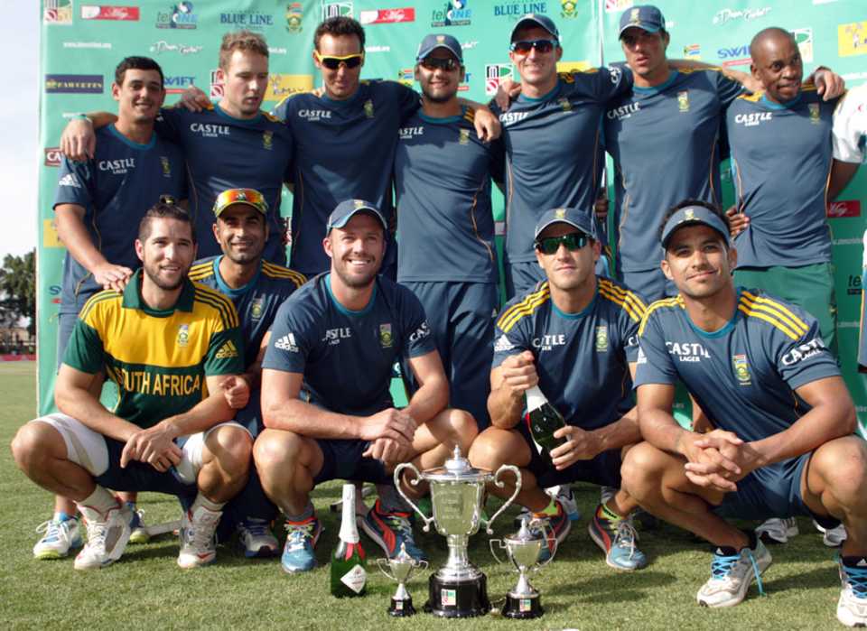 The South Africa players celebrate with the series trophy