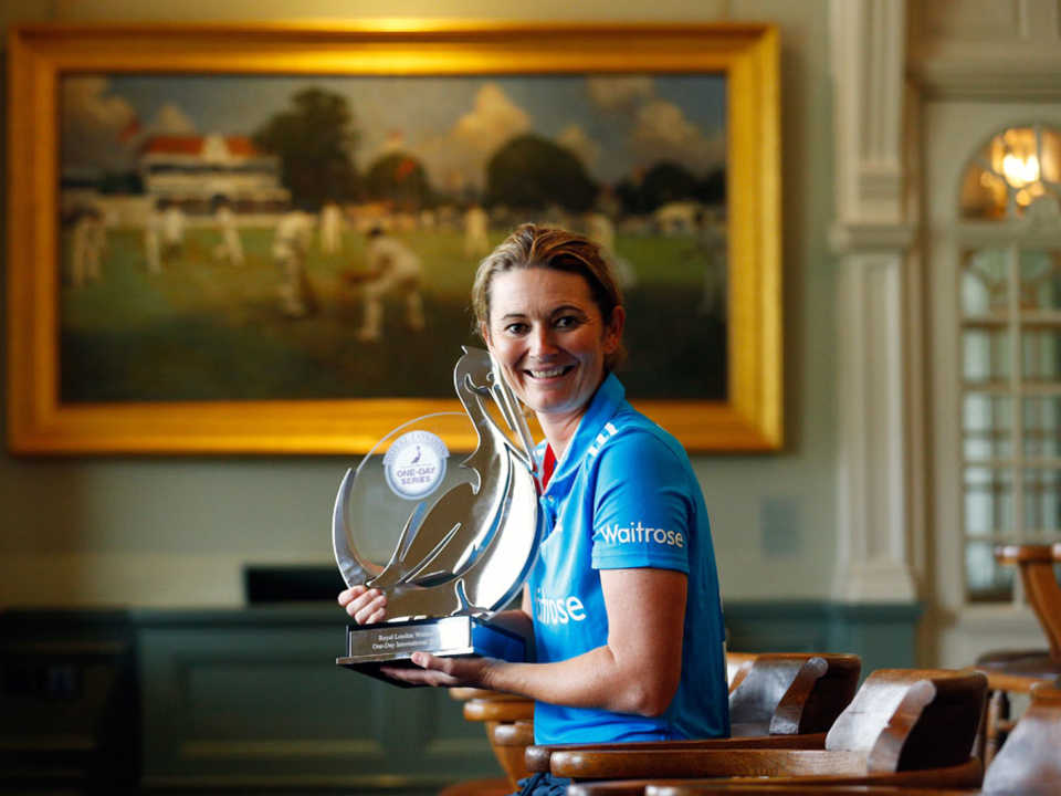 Charlotte Edwards poses with the series trophy after the third ODI