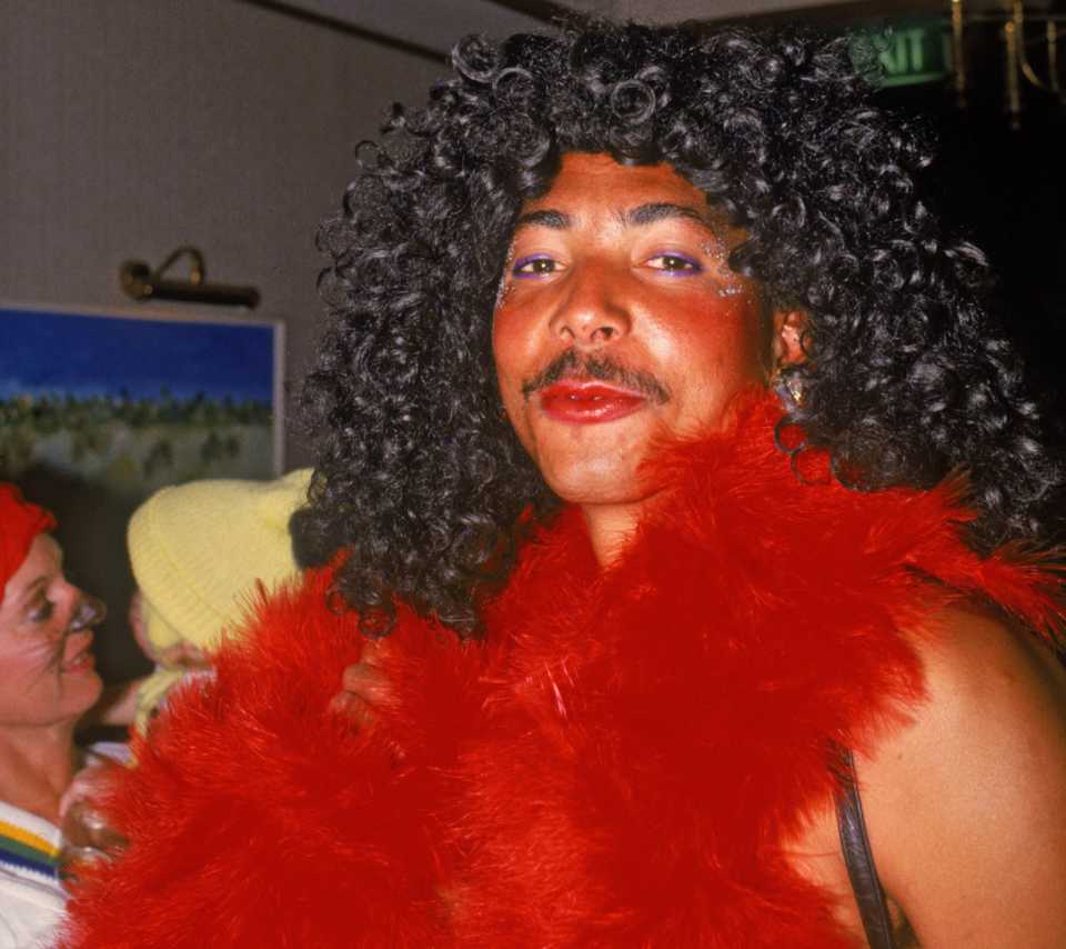 Phil DeFreitas dresses up in drag at the Christmas party, December 24, 1986