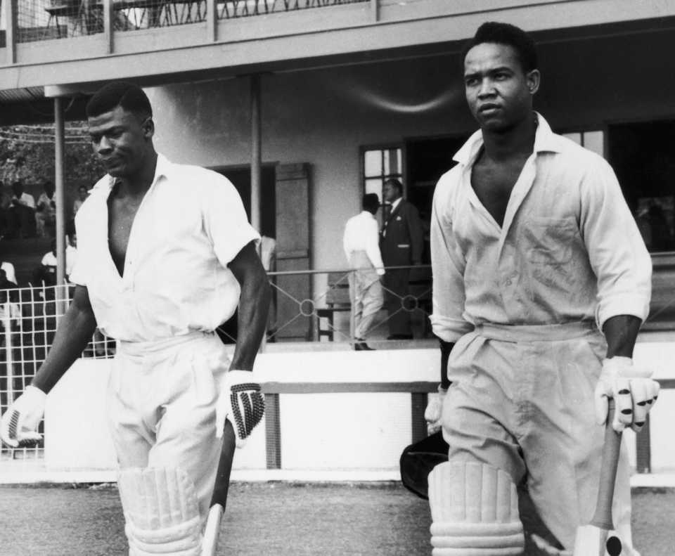 Seymour Nurse and Garry Sobers walk out to bat