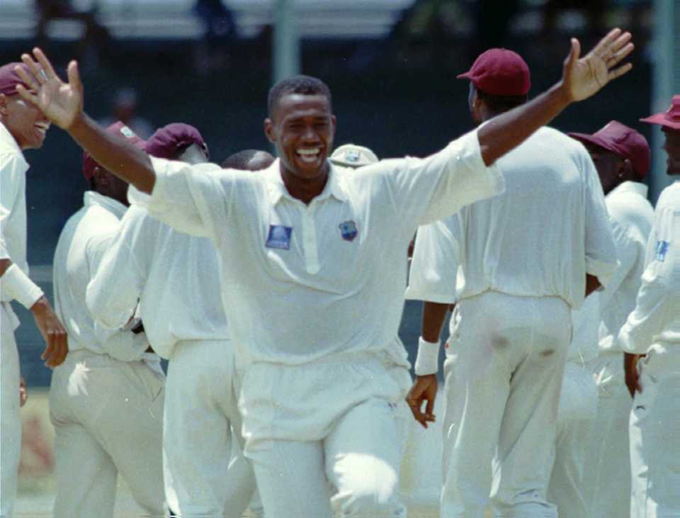 Ian Bishop celebrates a wicket