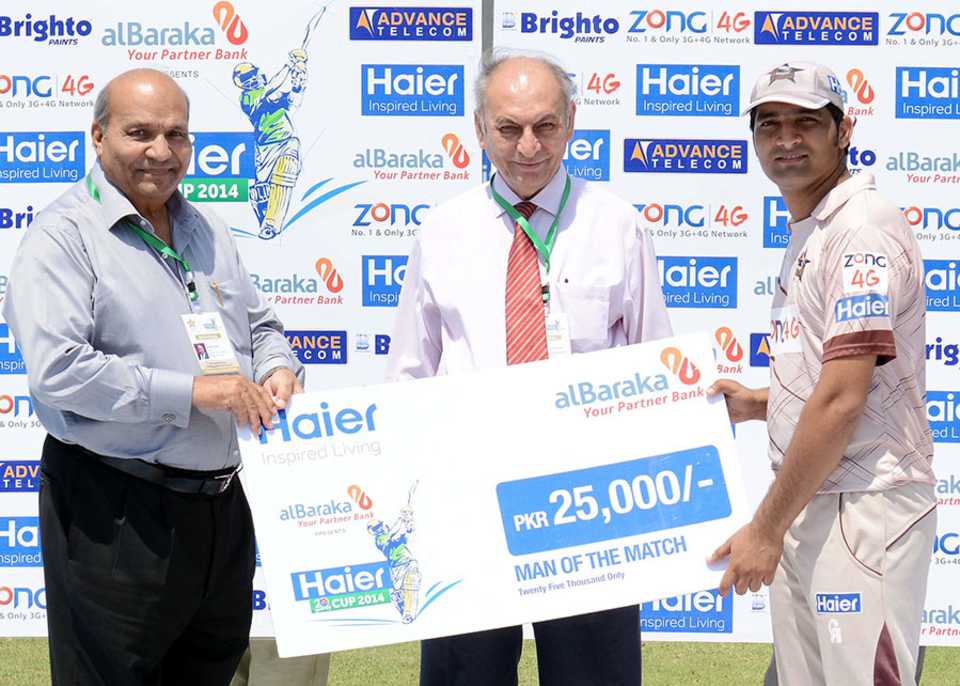 Shoaib Laghari poses with his Man of the Match cheque
