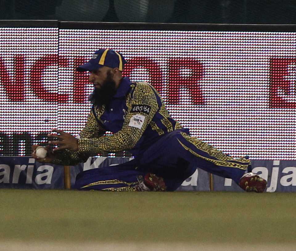 Hashim Amla took a diving catch but couldn't prevent himself from sliding into the boundary 