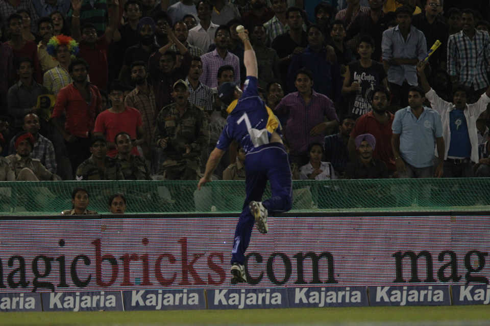 Flying Franklin: James Franklin attempts a catch on the boundary, Kings XI Punjab v Barbados Tridents, Champions League T20, Mohali, September 20, 2014