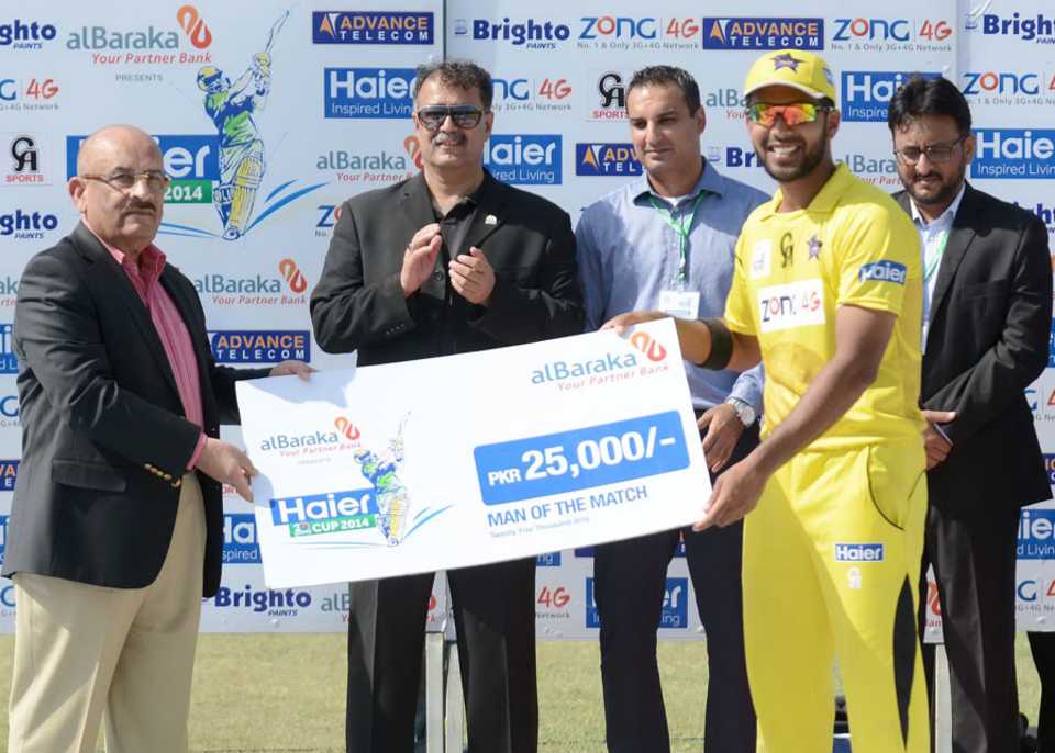 Zohaib Khan receives the Man-of-the-Match award