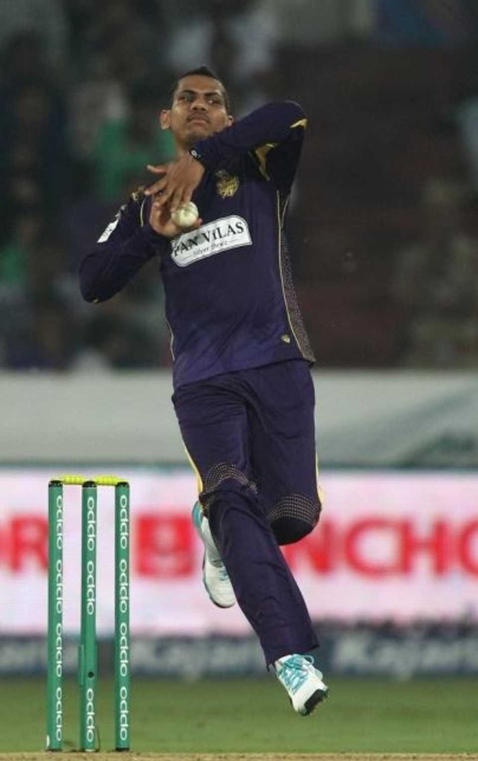Sunil Narine approaches the crease during his spell, Dolphins v Kolkata Knight Riders, Champions League T20, Group A, Hyderabad, September 29, 2014