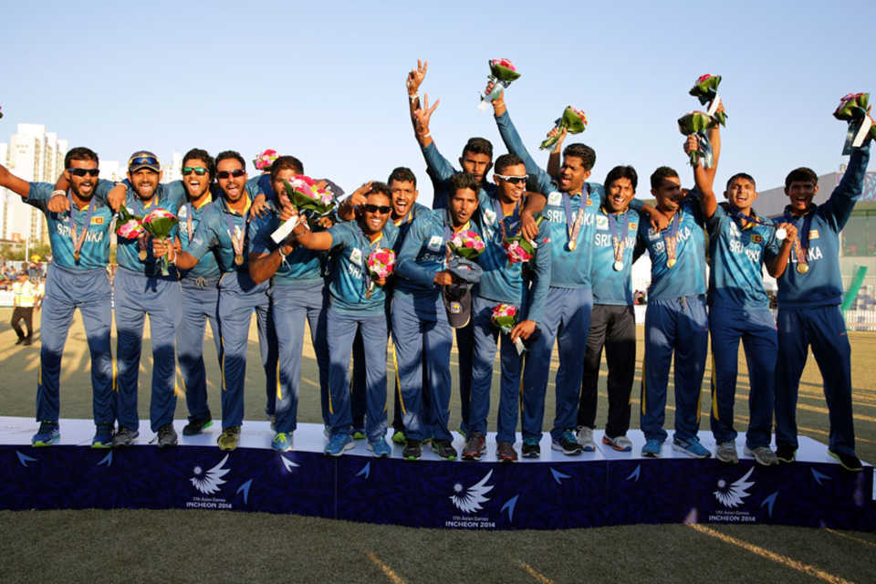 The Sri Lankan players celebrate after securing the gold medal in the Asian Games, Afghanistan v Sri Lanka, Final, Asian Games, Incheon, October 3, 2014