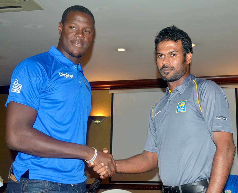 Carlos Brathwaite and Upul Tharanga shake hands at the start of the West Indies A tour of Sri Lanka
