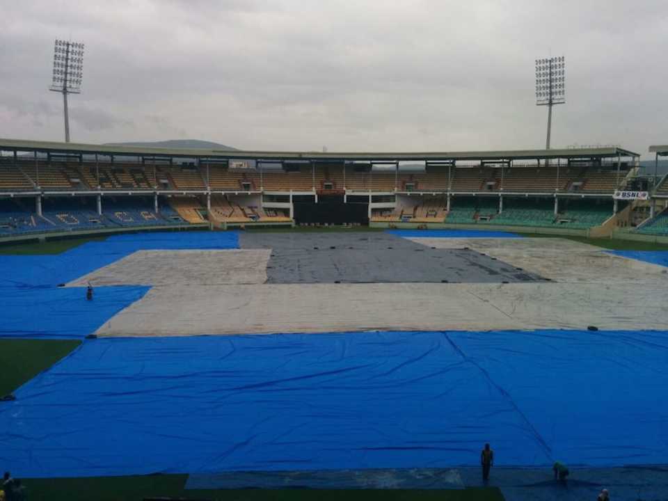 The ground at the ACA-VDCA Stadium is covered in anticipation of a cyclone, Visakhapatnam, October 11, 2014