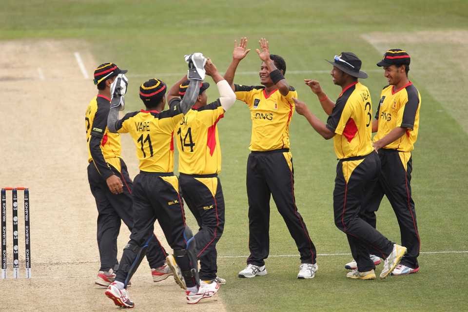 Papua New Guinea celebrate a wicket