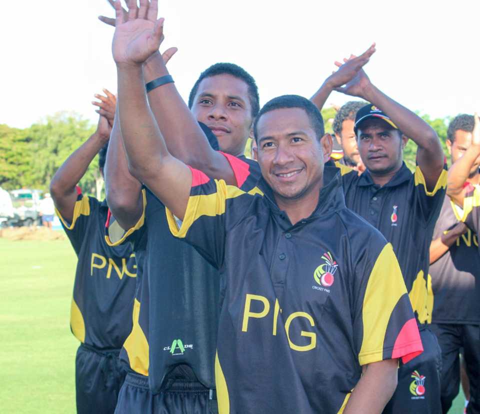 The Papua New Guinea players celebrate their four-wicket win against Hong Kong