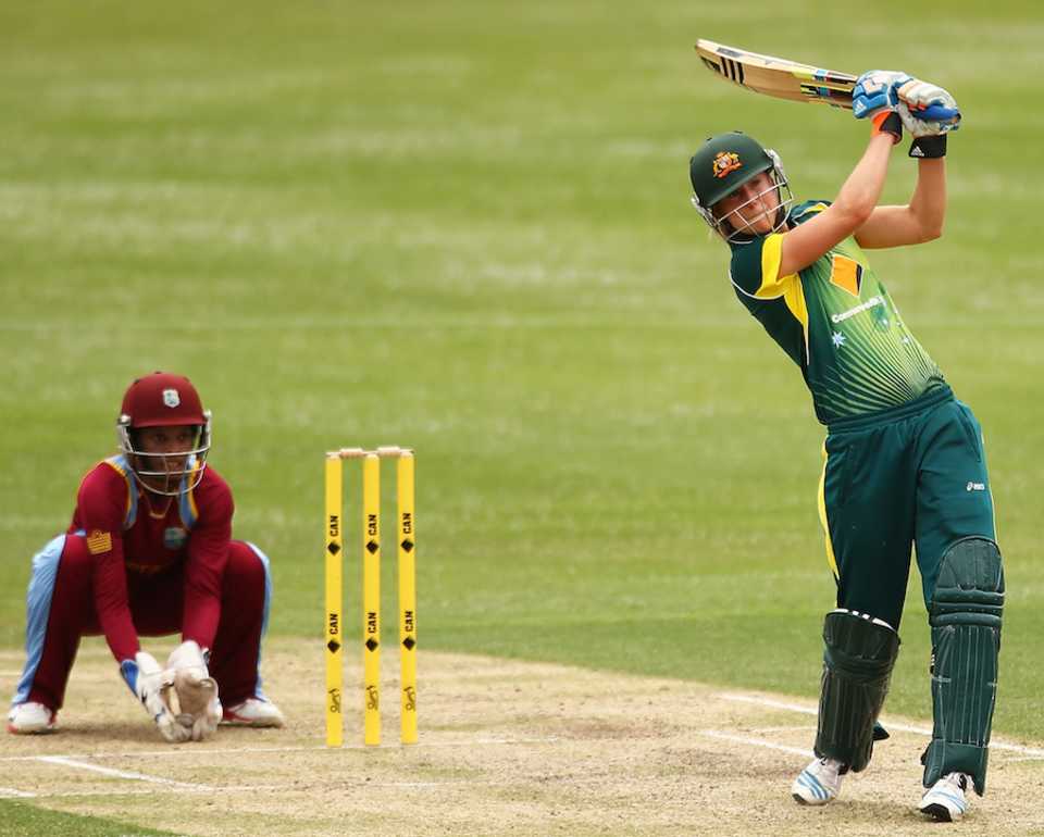 Ellyse Perry launches one down the ground