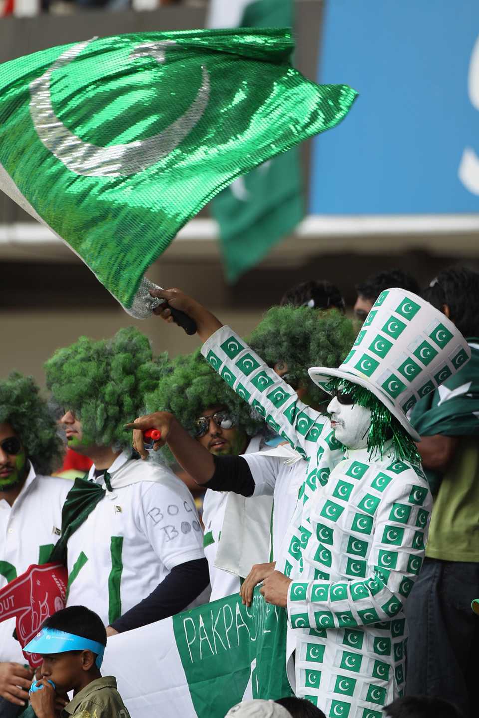A Pakistan fan brightens things up in the stands
