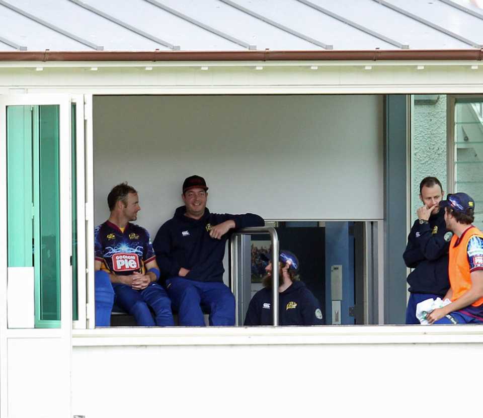 Jesse Ryder watches the game from the Otago dressing room