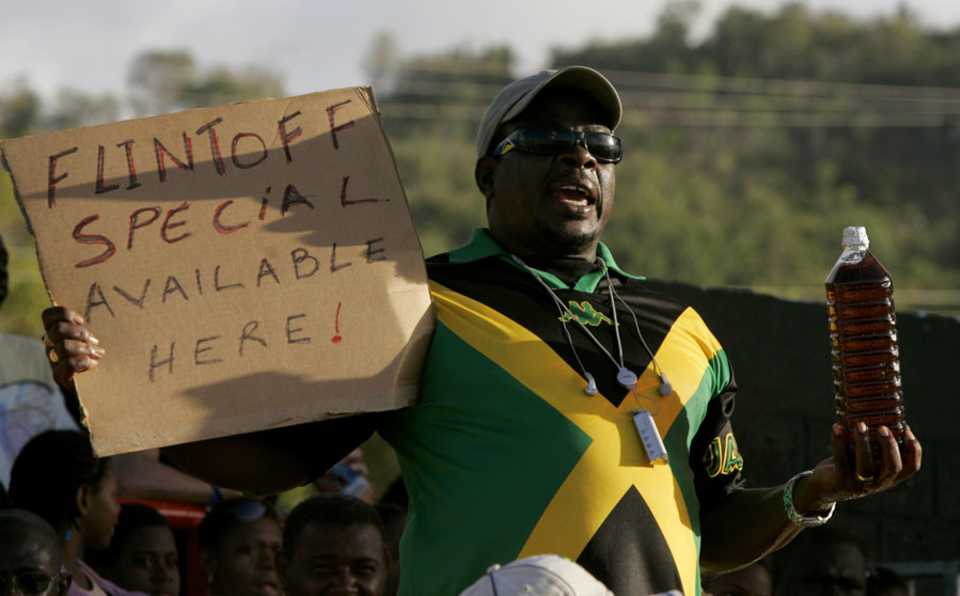 Soon after Andrew Flintoff was stripped of the England vice-captaincy for his drunken antics, a fan holds up a bottle of alcohol he refers to as "Flintoff special", England v Kenya, Group C, St Lucia, March 24, 2007