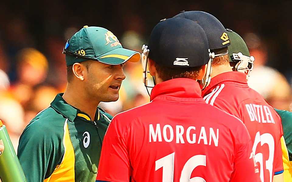 Michael Clarke, Jos Buttler and Eoin Morgan argue over a catch, Australia v England, 3rd ODI, Sydney, January 19, 2014