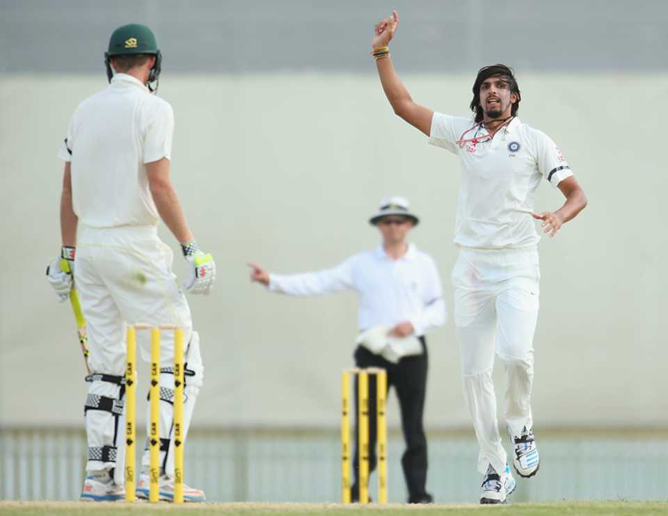 Another no-ball? In fact, the umpire is raising his finger to give Ishant Sharma the wicket of Alex Keath