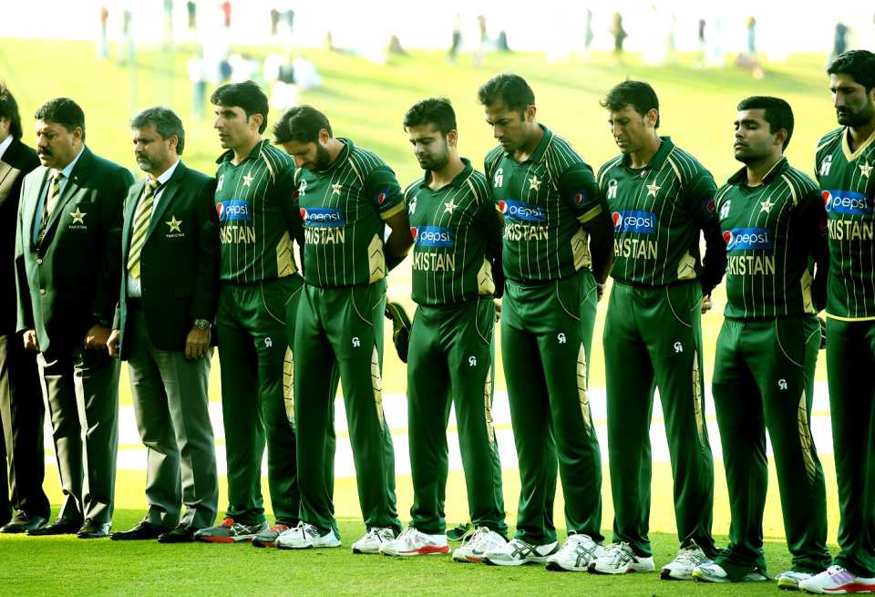 The Pakistan team observes two minutes of silence